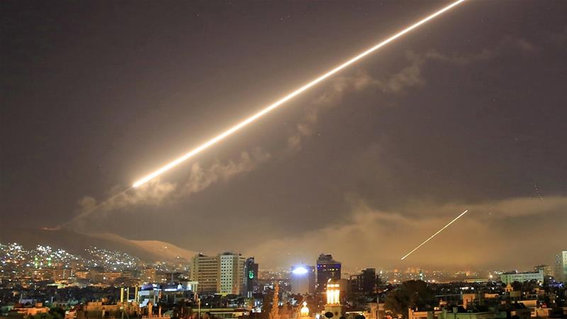 Syria air defences 'confront Israeli missiles' near Damascus