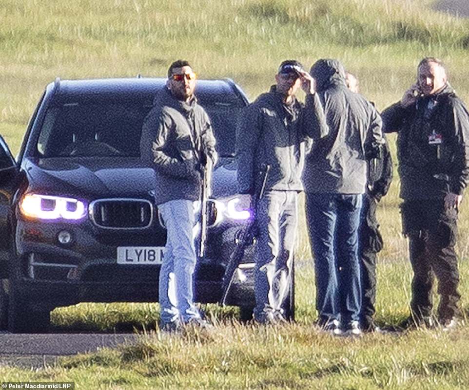 Two 'drone gang' suspects are arrested after hunt for 'cyclist in hi-vis jacket who was spotted