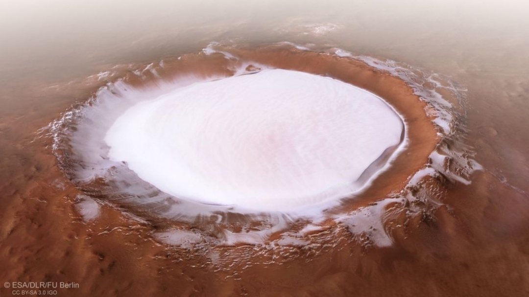 Christmas card from Mars: Astronomers snap images of giant 82km-wide ice-filled crater