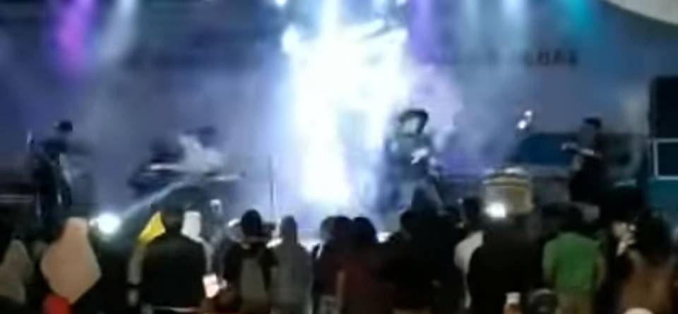 tsunami rip through stage as band performs