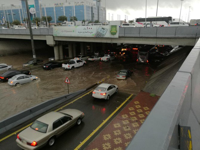 Dozens rescued from flooding as heavy rain shuts schools and roads in Saudi Arabia