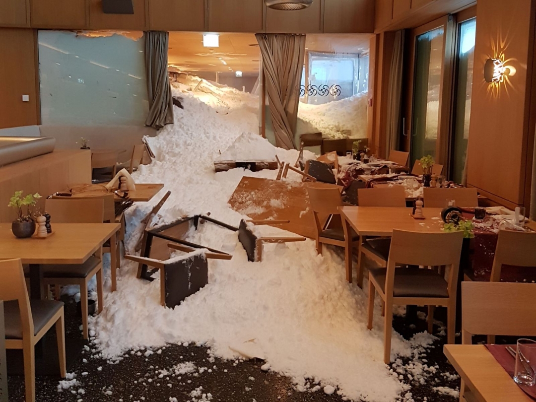 Avalanche hits hotel as heavy snow across Europe leaves 21 dead