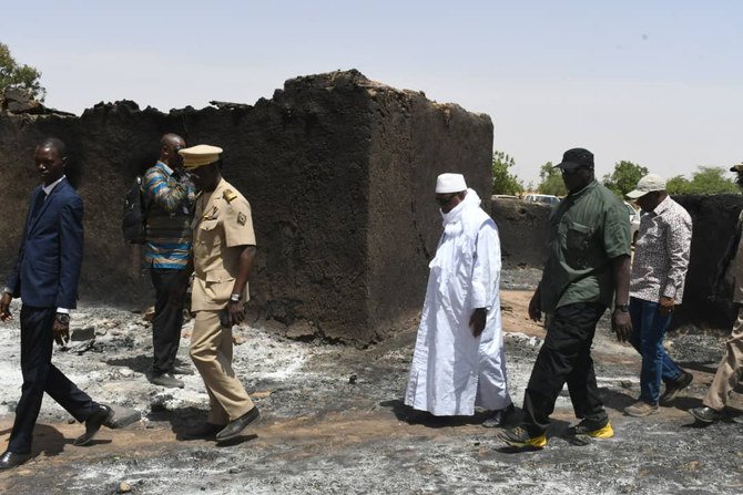 Mali arrests five suspects in killing of 157 villagers