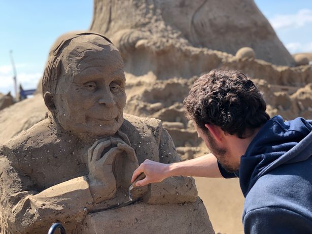 Sand Sculpture Of UK PM In Brexit Beheading Hits The Beach