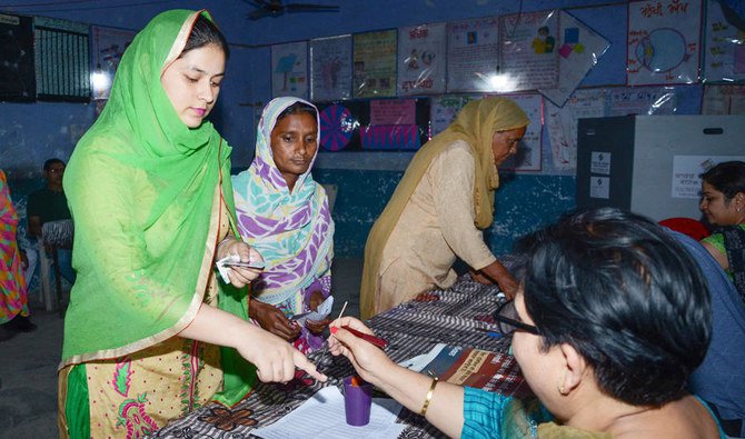 India’s Modi set to return to power with a bigger majority, exit polls show