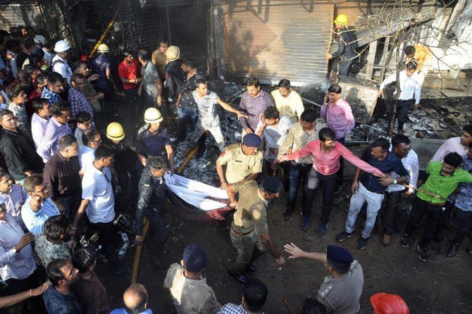 Indian police file case against 3 over coaching center fire, death toll rises to 20