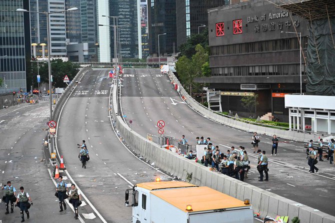 Uneasy calm in Hong Kong after day of violence over extradition bill