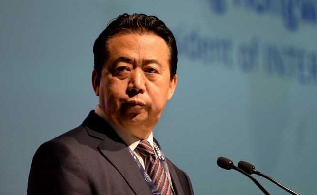 China's Former Interpol Chief Pleads Guilty To Bribery