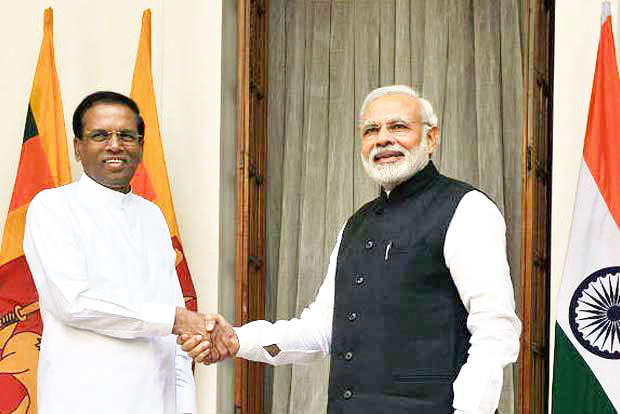 Narendra Modi in Sri Lanka, holds talks with Sirisena, Wicremasinghe