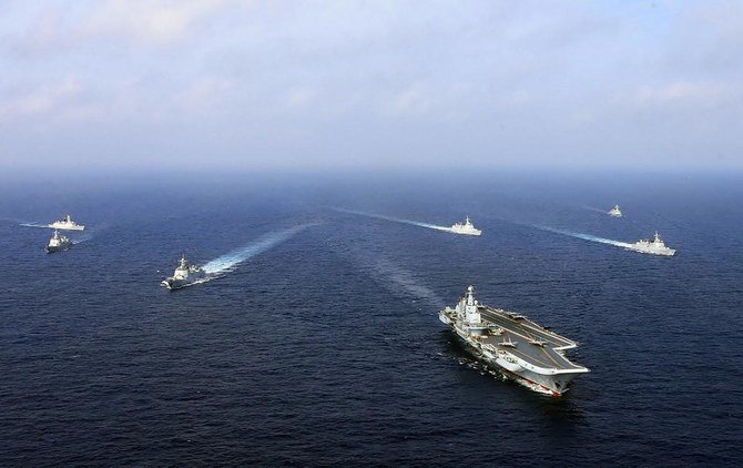 After Taiwan buys arms, China holds military drills on southeast coast