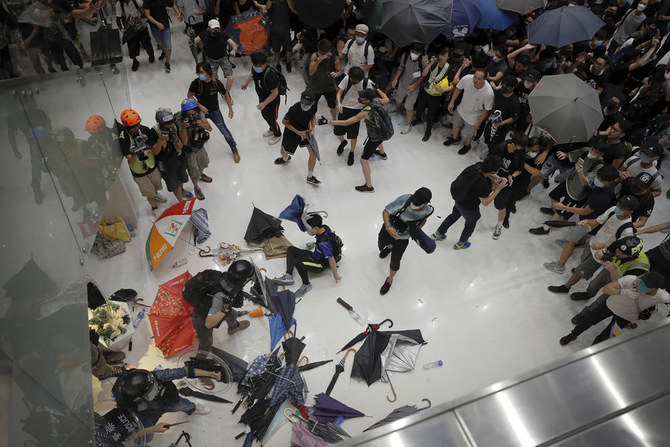 Clashes break out as Hong Kong protesters escalate fight in suburbs