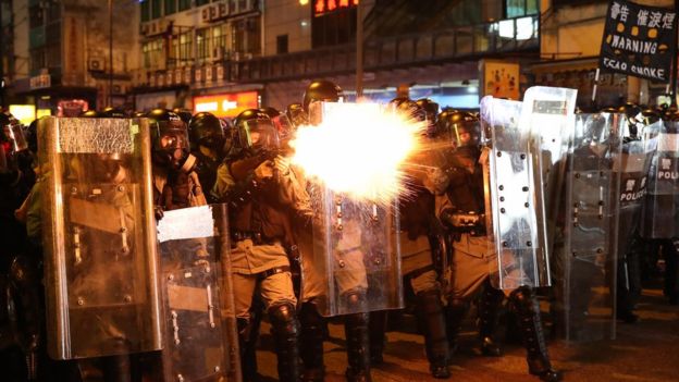 Hong Kong protests: Police fire tear gas near China's liaison office