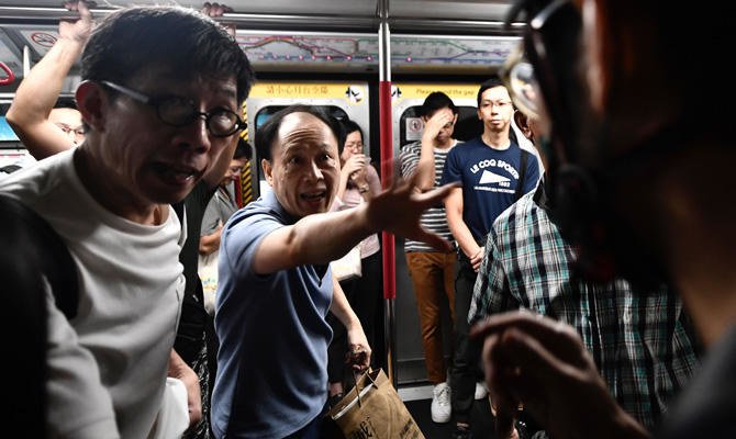 Hong Kong protests disrupt flights, subways as strike called