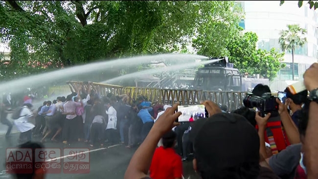 Police fire tear gas to disperse protesters near World Trade Center !