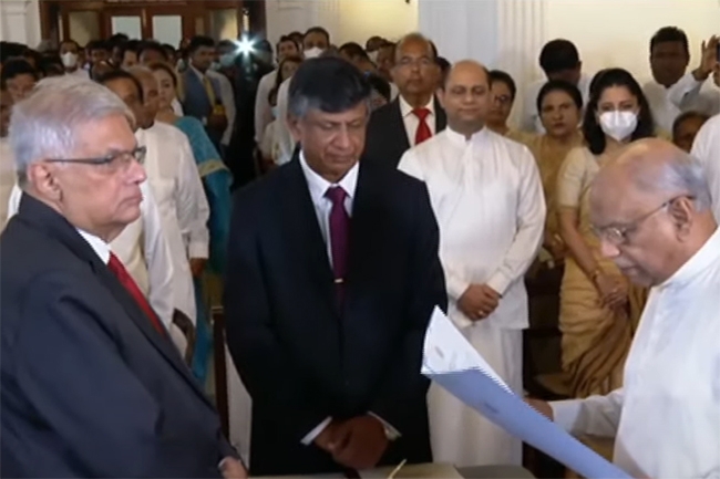 Another Rajapakse's team Dinesh Gunawardena sworn in as new Prime Minister