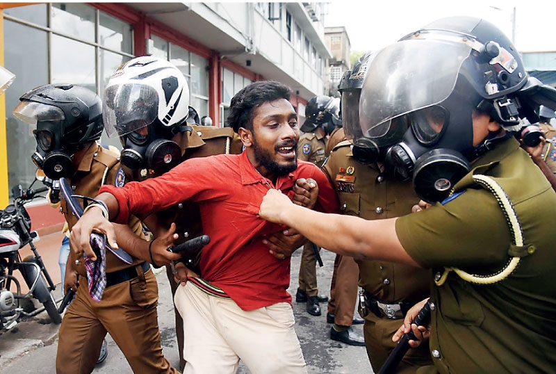 Police fire tear gas to disperse the protest; arrest six activists