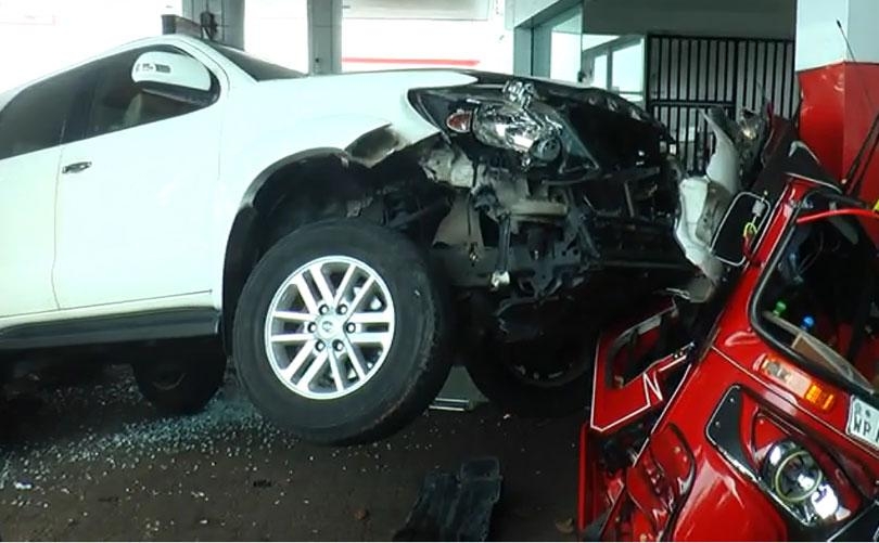 Luxury vehicle crashes into filling station