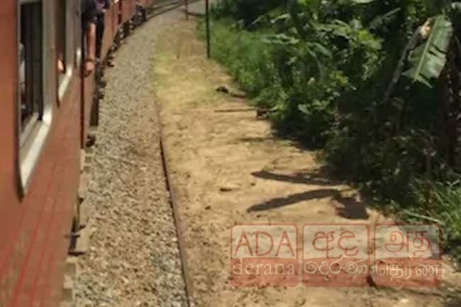 Youth injured after being stuck between two train cars